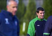 8 November 2001; Roy Keane, under the watchful eye of manager Mick McCarthy, during a Republic of Ireland Squad Training Session at John Hyland Park in Baldonnell, Dublin, ahead of the World Cup Play-off with Iran. Photo by Brendan Moran/Sportsfile