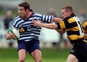 10 November 2001; Gary Browne of Blackrock College is tackled by Mike Prendergast of Young Munster during the AIB League match between Blackrock College and Young Munster at Stradbrook Road in Dublin. Photo by Matt Browne/Sportsfile