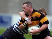 10 November 2001; Mick Lynch of Young Munster is tackled by John Fitzgerald of Blackrock College during the AIB League match between Blackrock College and Young Munster at Stradbrook Road in Dublin. Photo by Matt Browne/Sportsfile