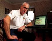 11 November 2001; Republic of Ireland official team sponsor eircom have set up a special page on their website where Irish soccer fans who are not travelling to the match in Iran can still support the team by sending a good luck message  on www.eircom.ie/soccer.  Republic of Ireland Manager Mick McCarthy is pictured here viewing the webpage where fans can register their messages of support. Photo by Brendan Moran/Sportsfile