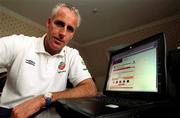 11 November 2001; Republic of Ireland official team sponsor eircom have set up a special page on their website where Irish soccer fans who are not travelling to the match in Iran can still support the team by sending a good luck message  on www.eircom.ie/soccer.  Republic of Ireland Manager Mick McCarthy is pictured here viewing the webpage where fans can register their messages of support. Photo by Brendan Moran/Sportsfile