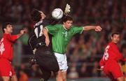 10 November 2001; Niall Quinn of Republic of Ireland in action against Ebrahim Mirzapour of Iran during the 2002 FIFA World Cup Qualification Play-Off Final First Leg match between Republic of Ireland and Iran at Lansdowne Road in Dublin. Photo by David Maher/Sportsfile