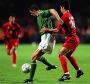 10 November 2001; Niall Quinn of Republic of Ireland in action against Rahman Rezaei of Iran during the 2002 FIFA World Cup Qualification Play-Off Final First Leg match between Republic of Ireland and Iran at Lansdowne Road in Dublin. Photo by Matt Browne/Sportsfile