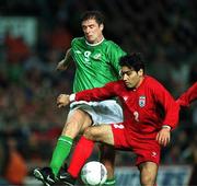 10 November 2001; Niall Quinn of Republic of Ireland in action against Mehdi Mahdavikia of Iran during the 2002 FIFA World Cup Qualification Play-Off Final First Leg match between Republic of Ireland and Iran at Lansdowne Road in Dublin. Photo by David Maher/Sportsfile