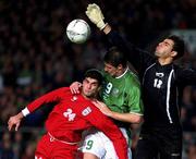 10 November 2001; Niall Quinn, Republic of Ireland, in action against Rahman Rezaei and goalkeeper Ebrahim Mirzapour, both of Iran, during the 2002 FIFA World Cup Qualification Play-Off Final First Leg match between Republic of Ireland and Iran at Lansdowne Road in Dublin. Photo by Brendan Moran/Sportsfile