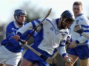 11 November 2001; Liam Hodgins of Connacht, in action against Eoin Kelly of Munster during the Interprovincial Railway Cup Hurling Final between Connacht and Munster at McDonagh Park in Nenagh, Tipperary. Photo by David Maher/Sportsfile
