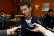 12 November 2001; Republic of Ireland's Mark Kinsella  is interviewed by media at Dublin Airport in Dublin, before the Republic of Ireland team's departure to Tehran, for the 2nd Leg of the World Cup Qualifying Play off against Iran. Photo by David Maher/Sportsfile