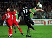 10 November 2001; Niall Quinn of Republic of Ireland in action against Iranian goalkeeper Ebrahim Mirzapour, 12, and team-mate Rahman Rezaei of Iran, during the 2002 FIFA World Cup Qualification Play-Off Final First Leg match between Republic of Ireland and Iran at Lansdowne Road in Dublin. Photo by Brendan Moran/Sportsfile