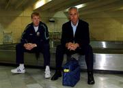 12 November 2001; Republic of Ireland's Steve Staunton, left, and manager Mick McCarthy pictured after the Irish team's arrival at Tehran Airport in Iran, ahead of the 2nd Leg of the World Cup Qualifying Play off against Iran. Photo by David Maher/Sportsfile