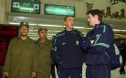 12 November 2001; Republic of Ireland players Dean Kiely, second from right, and Kevin Kilbane, right, pictured after the Irish team's arrival at Tehran Airport in Iran, ahead of the 2nd Leg of the World Cup Qualifying Play off against Iran. Photo by David Maher/Sportsfile