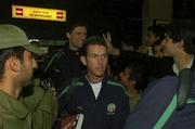12 November 2001; Republic of Ireland's Mark Kinsella, centre, and Niall Quinn pictured after the Irish team's arrival at Tehran Airport in Iran, ahead of the 2nd Leg of the World Cup Qualifying Play off against Iran. Photo by David Maher/Sportsfile