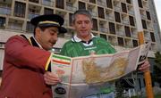 14 November 2001; Irish soccer fan Brendan O'Dell, from Corofin, Clare, gets some help in finding his way around Tehran with the help of the Hotel Commissionaire at the Estegal Grand Hotel in Tehran, Iran, ahead of the Iran v Republic of Ireland - 2002 FIFA World Cup Qualification Play-Off Final Second Leg. Photo by Brendan Moran/Sportsfile