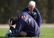 14 November 2001; Niall Quinn who did not take part during the squad training session, receives attention from team physio Mick Byrne during a Republic of Ireland Squad Training Session at Azadi Sports Complex in Tehran, Iran. Photo by David Maher/Sportsfile