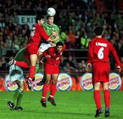 10 November 2001; Jason McAteer of Republic of Ireland in action against Mojahed Khaziravi, left, and Alireza Vahedinikbahkt of Iran during the 2002 FIFA World Cup Qualification Play-Off Final First Leg match between Republic of Ireland and Iran at Lansdowne Road in Dublin. Photo by Brendan Moran/Sportsfile