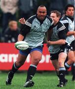 14 November 2001; Jonah Lomu is tackled by Andrew Mehrtens during a New Zealand rugby squad training session at Blackrock Rugby Club, Stradbrook in Dublin. Photo by Matt Browne/Sportsfile