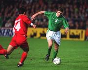 10 November 2001; Niall Quinn of Republic of Ireland in action against Rahman Rezaei of Iran during the 2002 FIFA World Cup Qualification Play-Off Final First Leg match between Republic of Ireland and Iran at Lansdowne Road in Dublin. Photo by Brendan Moran/Sportsfile