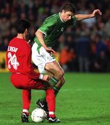 10 November 2001; Niall Quinn of Republic of Ireland in action against Rahman Rezaei of Iran during the 2002 FIFA World Cup Qualification Play-Off Final First Leg match between Republic of Ireland and Iran at Lansdowne Road in Dublin. Photo by Brendan Moran/Sportsfile