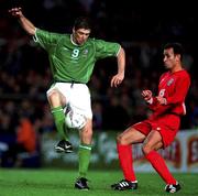 10 November 2001; Niall Quinn of Republic of Ireland in action against Yahya Golmohammadi of Irand during the 2002 FIFA World Cup Qualification Play-Off Final First Leg match between Republic of Ireland and Iran at Lansdowne Road in Dublin. Photo by David Maher/Sportsfile