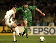 15 November 2001; Kevin Kilbane of Republic of Ireland in action against Kharim Bagheri of Iran during the 2002 FIFA World Cup Qualification Play-Off Final Second Leg match between Iran and the Republic of Ireland at Azadi Stadium in Tehran, Iran. Photo by Brendan Moran/Sportsfile