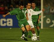 15 November 2001; David Connolly of Republic of Ireland in action against Ali Karimi of Iran during the 2002 FIFA World Cup Qualification Play-Off Final Second Leg match between Iran and the Republic of Ireland at Azadi Stadium in Tehran, Iran. Photo by Ray McManus/Sportsfile