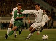 15 November 2001; David Connolly of Republic of Ireland in action against Yahya Golmohammadi of Iran during the 2002 FIFA World Cup Qualification Play-Off Final Second Leg match between Iran and the Republic of Ireland at Azadi Stadium in Tehran, Iran. Photo by David Maher/Sportsfile
