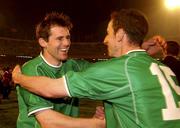 15 November 2001; Republic of Ireland players Kevin Kilbane, left, and Andy O'Brien celebrate qualification for the World Cup Finals following the 2002 FIFA World Cup Qualification Play-Off Final Second Leg match between Iran and the Republic of Ireland at Azadi Stadium in Tehran, Iran. Photo by David Maher/Sportsfile