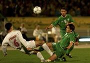 15 November 2001; Matt Holland of Republic of Ireland, right, in action against Kharim Bageri of Iran during the 2002 FIFA World Cup Qualification Play-Off Final Second Leg match between Iran and the Republic of Ireland at Azadi Stadium in Tehran, Iran. Photo by Brendan Moran/Sportsfile