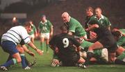 17 November 2001; Eric Miller of Ireland goes over to score a try despite the efforts of Byron Kelleher of New Zealand during the International Friendly match between Ireland and New Zealand at Lansdowne Road in Dublin. Photo by Matt Browne/Sportsfile