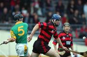 18 November 2001; Andy Moloney of Ballygunner, in action against Bryan Duff of Toomevara during the AIB Munster Senior Club Hurling Semi-Final between Toomevara and Ballygunner at Semple Stadium in Thurles, Tipperary. Photo by David Maher/Sportsfile