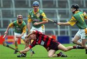 18 November 2001; Niall O'Donnell of Ballygunner in action against Terry Dunne, and Michael Bevans, right, both of Toomevara during the AIB Munster Senior Club Hurling Semi-Final between Toomevara and Ballygunner at Semple Stadium in Thurles, Tipperary. Photo by David Maher/Sportsfile