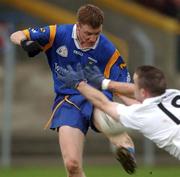 18 November 2001; Cormac Davey of Kildare trys to block the shot of Thomas Burke of Wicklow during the O'Byrne Cup Group 2 match between Wicklow and Kildare at the County Grounds in Aughrim, Wicklow. Photo by Matt Browne/Sportsfile