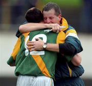14 October 2001; Richie Power, trainer of Carrickshock celebrates with Damien Raggett after Carrickshock had defeated Ballyhale Shamrocks in the Kilkenny Minor Hurling Club Championship Final match between Ballyhale Shamrocks and Carrickshock at Nowlan Park in Kilkenny Photo by Damien Eagers/Sportsfile
