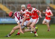 23 October 2016; Shay Casey of Loughgiel Shamrocks in action against Eanna Cassidy of Slaughtneil Emmetts during the AIB Ulster GAA Hurling Senior Club Championship Final game between Loughgiel Shamrocks and Slaughtneil Emmetts at the Athletic Grounds in Armagh. Photo by Philip Fitzpatrick/Sportsfile