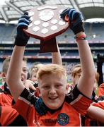 26 October 2016; Holy Trinity SNS, Donaghmede, captain Eóin Kiernan lifts the shield after beating Our Lady of Good Counsel BNS, Johnstown in the Sciath Corn Chumann na nGael final during the Allianz Cumann na mBunscol Finals at Croke Park in Dublin. Photo by Piaras Ó Mídheach/Sportsfile
