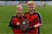 26 October 2016; Holy Trinity SNS, Donaghmede, players Seán Browne, left, and Eóin Kieran with the shield after beating Our Lady of Good Counsel BNS, Johnstown in the Sciath Corn Chumann na nGael final during the Allianz Cumann na mBunscol Finals at Croke Park in Dublin. Photo by Piaras Ó Mídheach/Sportsfile