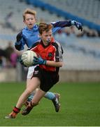 26 October 2016; Ross Tierney of Holy Trinity SNS, Donaghmede, in action against Conor McManus of Our Lady of Good Counsel BNS, Johnstown in the Sciath Corn Chumann na nGael final during the Allianz Cumann na mBunscol Finals at Croke Park in Dublin. Photo by Piaras Ó Mídheach/Sportsfile