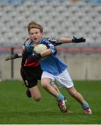 26 October 2016; Conor Lowry of Our Lady of Good Counsel BNS, Johnstown, in action against Ross Tierney of Holy Trinity SNS, Donaghmede, in the Sciath Corn Chumann na nGael final during the Allianz Cumann na mBunscol Finals at Croke Park in Dublin. Photo by Piaras Ó Mídheach/Sportsfile