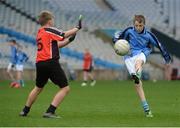 26 October 2016; Fionn O'Donnell of Our Lady of Good Counsel BNS, Johnstown, in action against Jamie Cullen Holy Trinity SNS, Donaghmede, in the Sciath Corn Chumann na nGael final during the Allianz Cumann na mBunscol Finals at Croke Park in Dublin. Photo by Piaras Ó Mídheach/Sportsfile