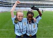 26 October 2016; The St. Mary's NS, Garristown players Lucy Donnelly, left, and Ketia Mulel after beating Gaelscoil Mológa, Harold's Cross, in the Corn an Chladaigh final during the Allianz Cumann na mBunscol Finals at Croke Park in Dublin. Photo by Piaras Ó Mídheach/Sportsfile