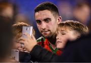 26 October 2016; James McCarthy of Ballymun Kickhams poses for photographs with supporters following the Dublin County Senior Club Football Championship Semi-Final match between St Vincent's and Ballymun Kickhams at Parnell Park in Dublin. Photo by Stephen McCarthy/Sportsfile