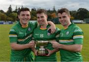 22 October 2016; Ireland players, from left, Philip Lucid, Keith Carmody and Jack Goulding, all from Kerry, with the cup after the 2016 U21 Hurling/Shinty International Series match between Ireland and Scotland at Bught Park in Inverness, Scotland. Photo by Piaras Ó Mídheach/Sportsfile