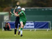22 October 2016; Jack Sheridan of Ireland in action against Ewen Campbell of Scotland during the 2016 U21 Hurling/Shinty International Series match between Ireland and Scotland at Bught Park in Inverness, Scotland. Photo by Piaras Ó Mídheach/Sportsfile