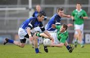 13 March 2011; Seanie Buckley, Limerick, in action against Mark McKeever, left, and Ray Cullivan, Cavan. Allianz Football League, Division 3, Round 4, Limerick v Cavan, Gaelic Grounds, Limerick. Picture credit: Diarmuid Greene / SPORTSFILE