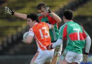 13 March 2011; Micheal O'Rourke, Armagh, in action against Jason Gibbons and Ruaidhri O'Connor, Mayo. Allianz Football League, Division 1, Round 4, Mayo v Armagh, McHale Park, Castlebar, Co. Mayo. Picture credit: Brian Lawless / SPORTSFILE