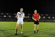 12 March 2011; Cork captain Patrick Kelly and Down captain Danny Hughes, right, await the referee to conduct the coin toss. Allianz Football League, Division 1, Round 4, Cork v Down, Pairc Ui Rinn, Cork. Picture credit: Stephen McCarthy / SPORTSFILE