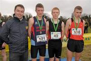 12 March 2011; Gavin Ellis of Aviva alongside winner of the Intermediate Boys race Sean Tobin, High School Clonmel, Co. Tipperary, 2nd place Ian O'Hairtneid, left, Colaiste Daibheid, Cork, and 3rd place Aaron Hanlon, right, St. Mary's, Drogheda, Co. Louth, at the AVIVA All-Ireland Schools Cross Country Championships 2011. National Sports Campus, Abbotstown, Dublin. Photo by Sportsfile
