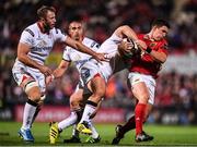28 October 2016; Ian Keatley of Munster is tackled by Wiehahn Herbst and Roger Wilson, left, of Ulster during the Guinness PRO12 Round 7 match between Ulster and Munster at Kingspan Stadium, Ravenhill Park in Belfast. Photo by Stephen McCarthy/Sportsfile