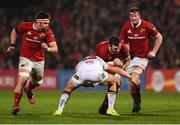28 October 2016; Peter O'Mahony of Munster is tackled by Luke Marshall of Ulster during the Guinness PRO12 Round 7 match between Ulster and Munster at Kingspan Stadium, Ravenhill Park in Belfast. Photo by Ramsey Cardy/Sportsfile