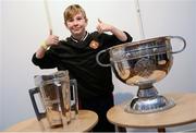 29 October 2016; Ben Bulman, age 12, from Youghan, Co Cork, pictured with the Liam MacCarthy and Sam Maguire cups in attendance during the GAA Youth Forum 2016 at Croke Park in Dublin. Photo by Cody Glenn/Sportsfile