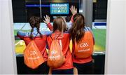 29 October 2016; Megan Gallagher, from left, age 13, from Monivea, Co Galway, Erin Dolan, age 13, from Craughwell, Co Galway, and Eibhlin Ni Fhlatharta, age 13, from Monivea, Co Galway,wave to tours during the GAA Youth Forum 2016 at Croke Park in Dublin. Photo by Cody Glenn/Sportsfile